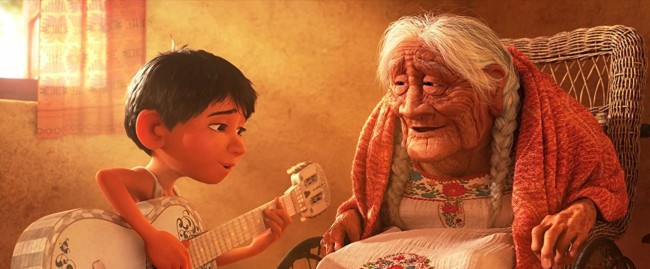 COCO, from left: Miguel (voice: Anthony Gonzalez), Mama Coco (voice: Ana Ofelia Murguia), 2017. © Walt Disney Studios Motion Pictures /Courtesy Everett Collection